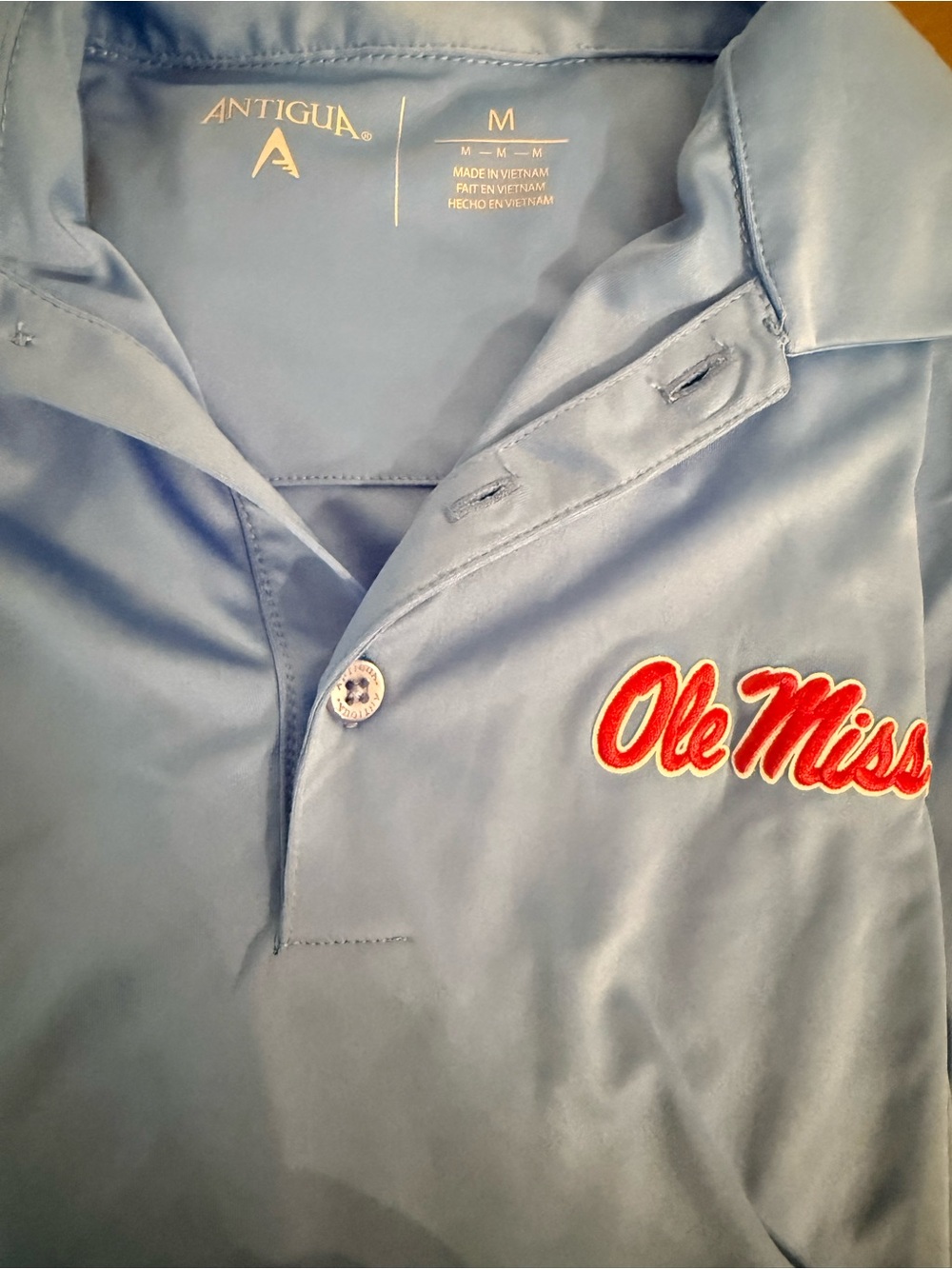 Antigua Light Blue Ole Miss Script Polo